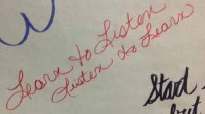 image of cursive writing saying Learn to Listen, Listen to Learn