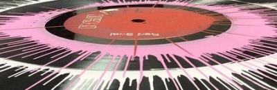Photo of paint splatter on a long playing record